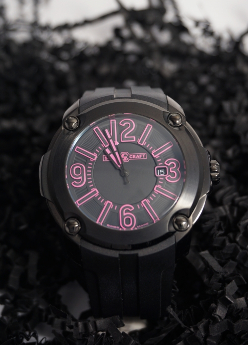 reloj negro y rosa de caucho